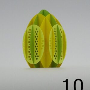 Gulgrønt kartonæg med mønster af små sekskanter